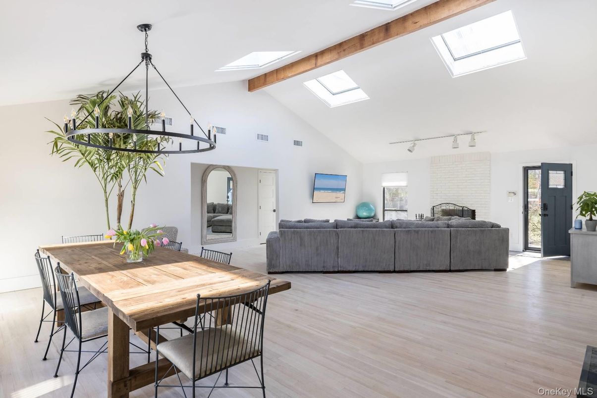 Dining room, Fireplace, Interior, Living room, Pendant Lights, Wooden Beams, Wood Texture Flooring