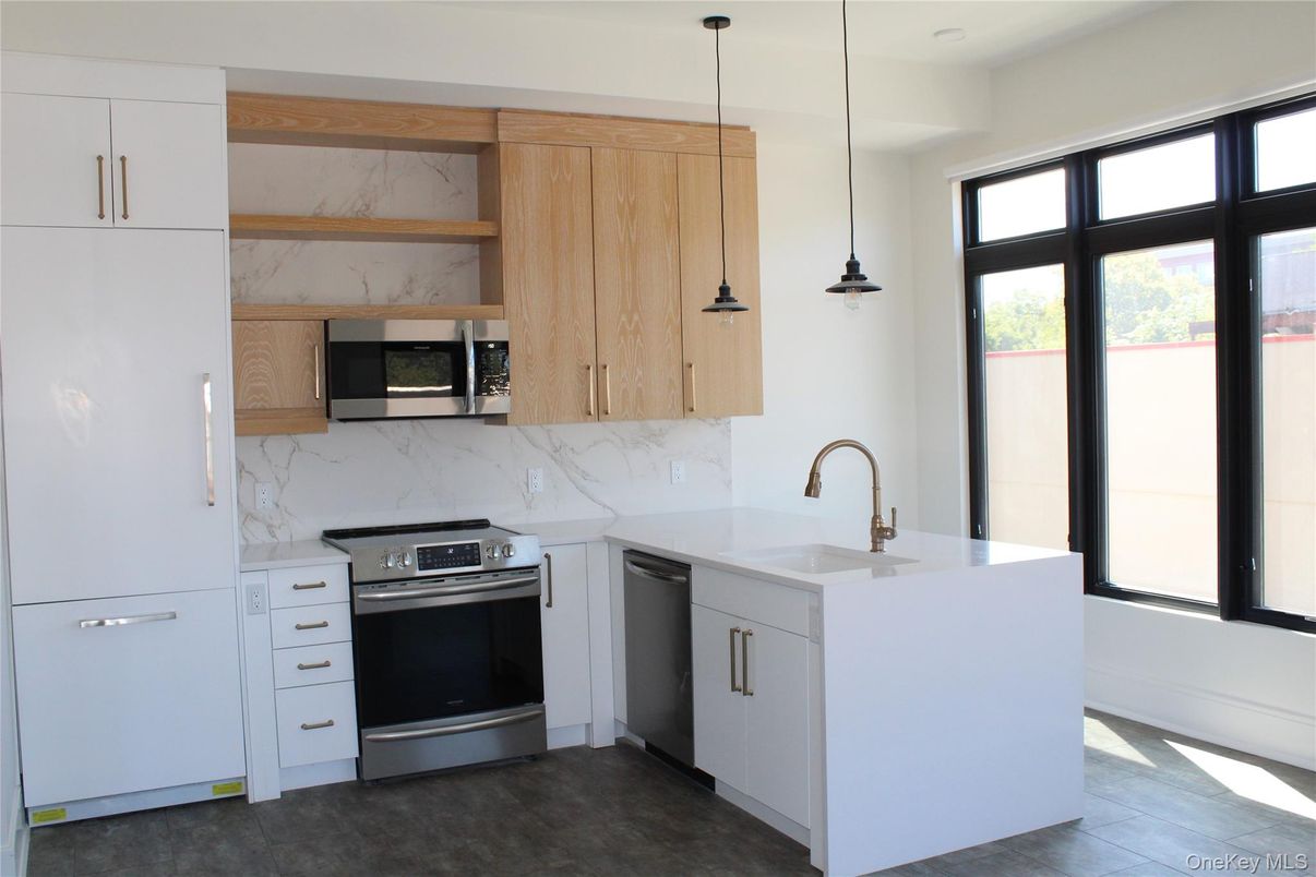 Interior, Kitchen, Marble Walls, Pendant Lights, Stainless Steel Appliances