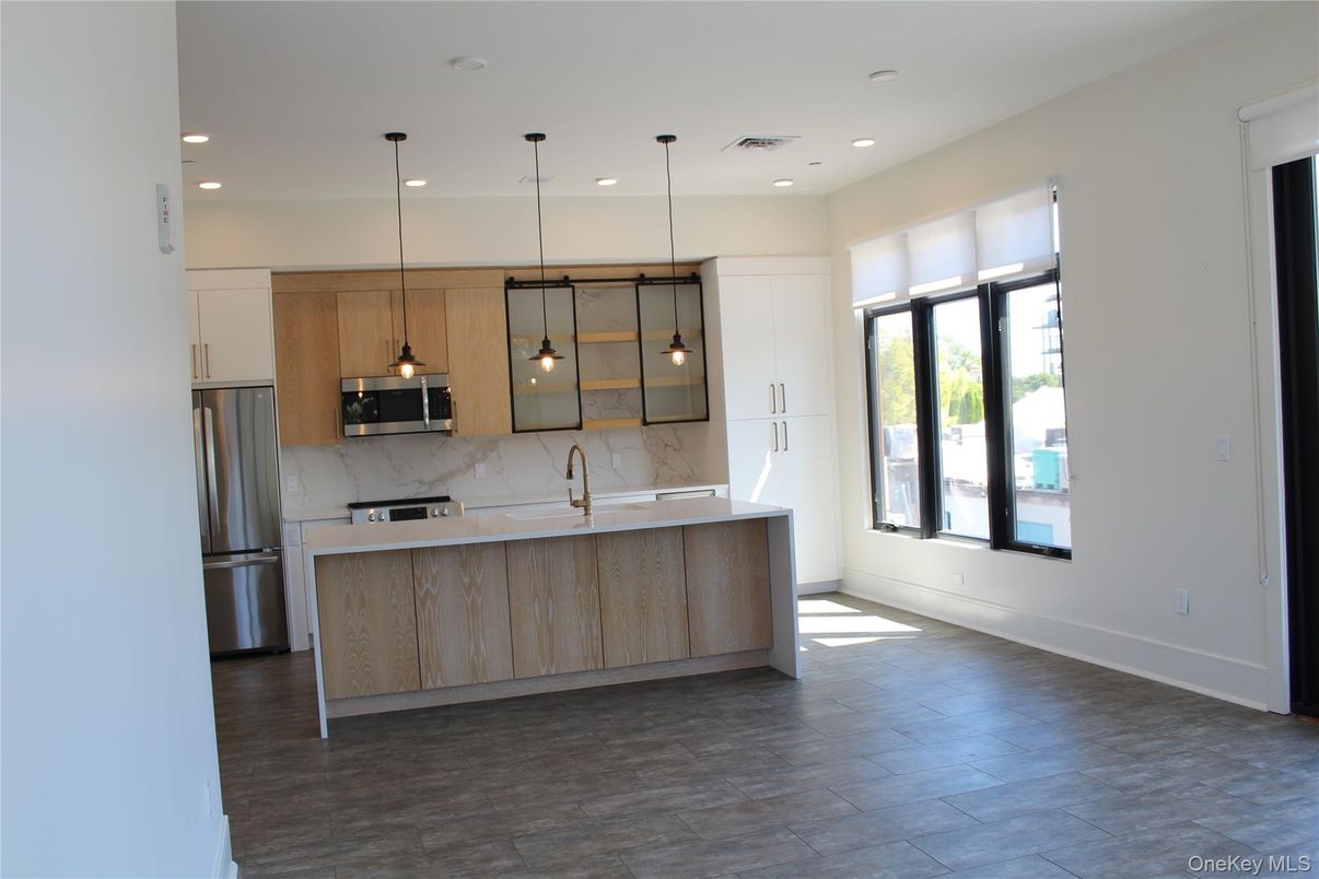Interior, Kitchen, Marble Walls, Pendant Lights, Recessed Lighting, Stainless Steel Appliances