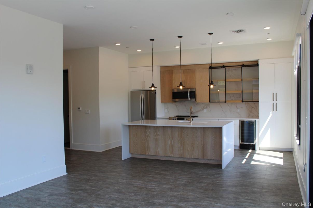 Interior, Kitchen, Marble Walls, Pendant Lights, Recessed Lighting, Stainless Steel Appliances
