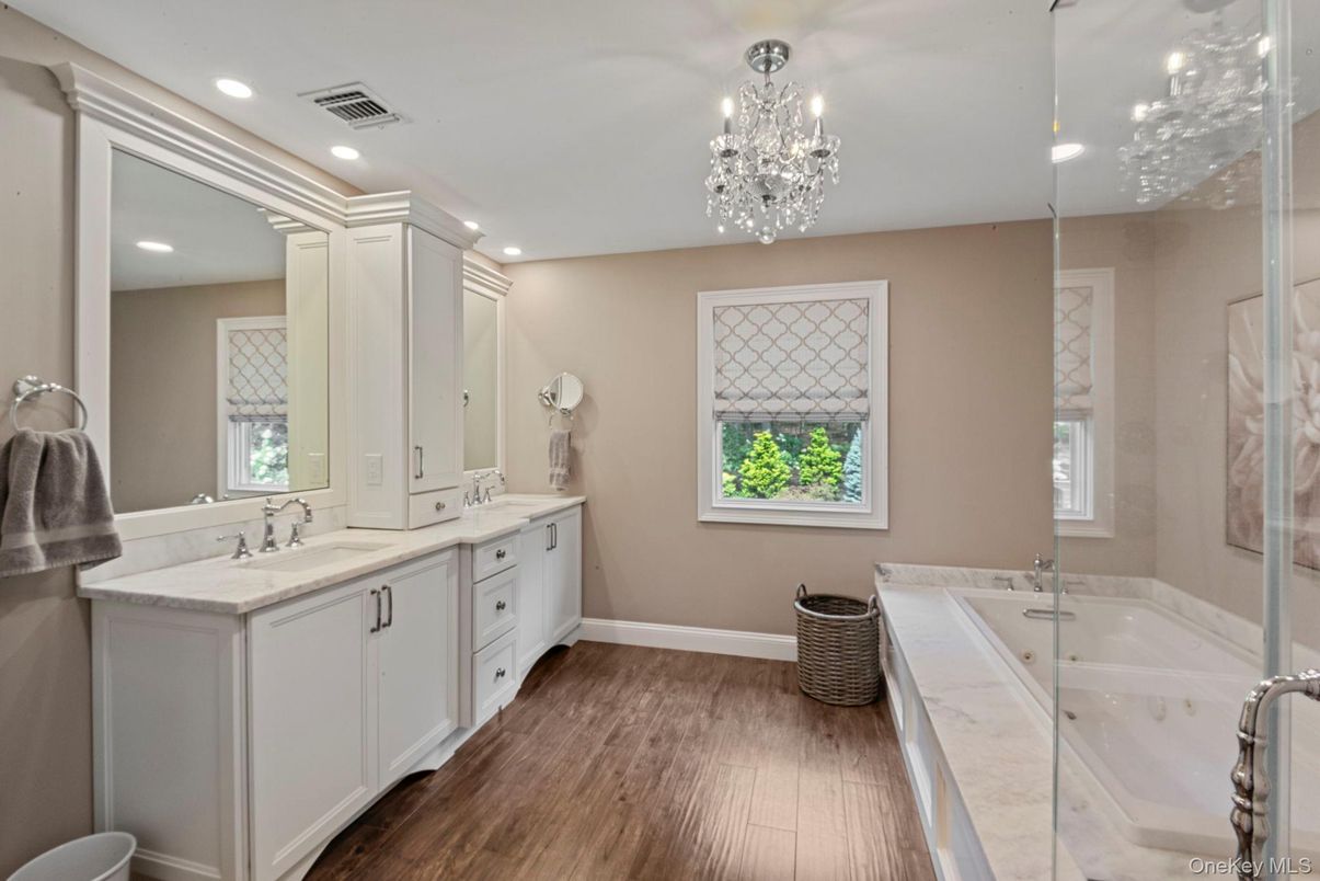 Bathroom, Chandelier, Dual Sink Vanities, Interior, Recessed Lighting, Wood Texture Flooring