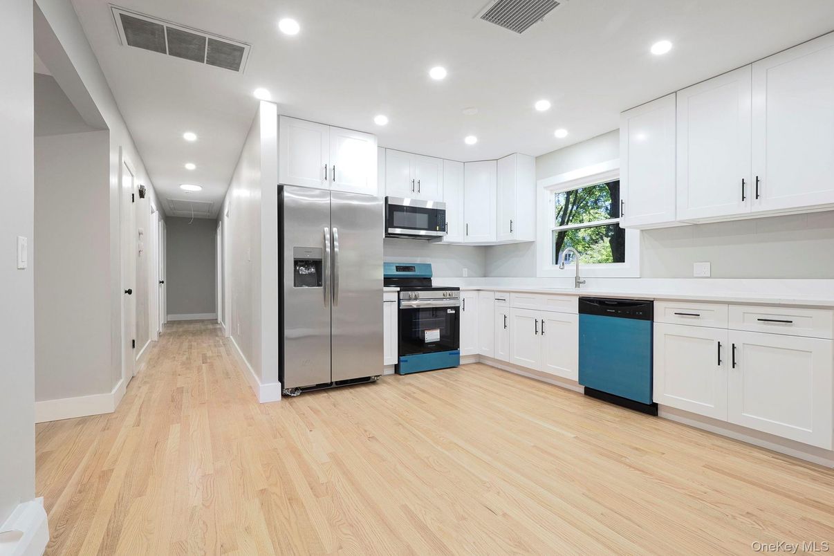 Interior, Kitchen, Recessed Lighting, Stainless Steel Appliances, Wood Texture Flooring