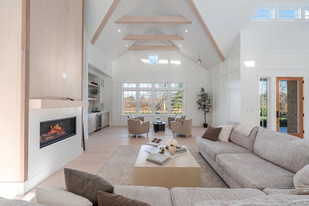 Dining room, Fireplace, Interior, Living room, Recessed Lighting, Wood Texture Flooring