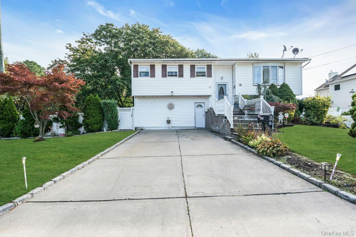 Attached, Backyard, Exterior, Facade, Raised Ranch