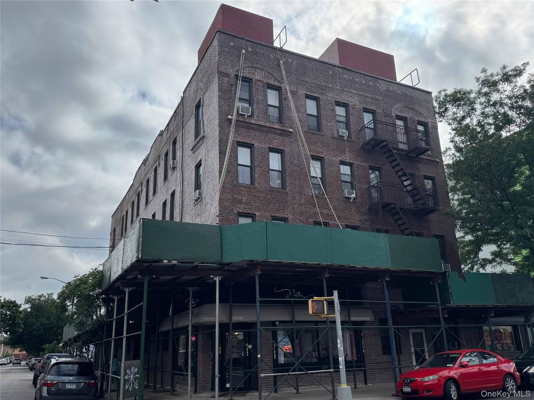 Exterior, Facade, Brick Facade, Condo Building
