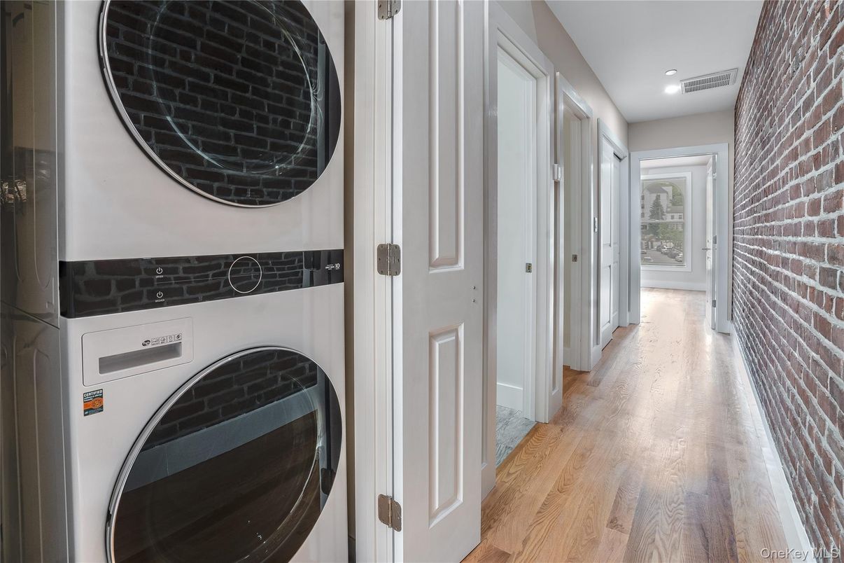 Interior, Recessed Lighting, Stone Walls, Utility Closets, Washer, Wood Texture Flooring