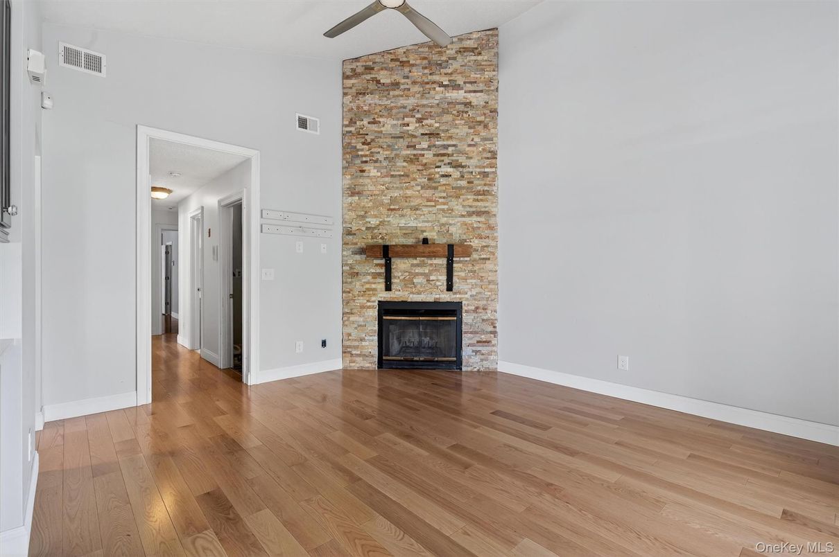 Empty room, Fireplace, Interior, Stone Walls, Wood Texture Flooring