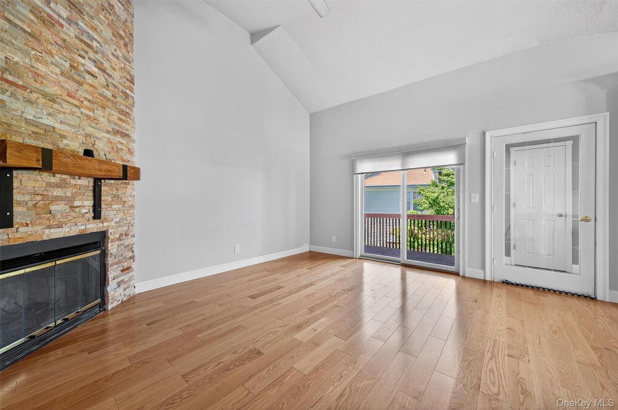 Empty room, Fireplace, Interior, Stone Walls, Wood Texture Flooring