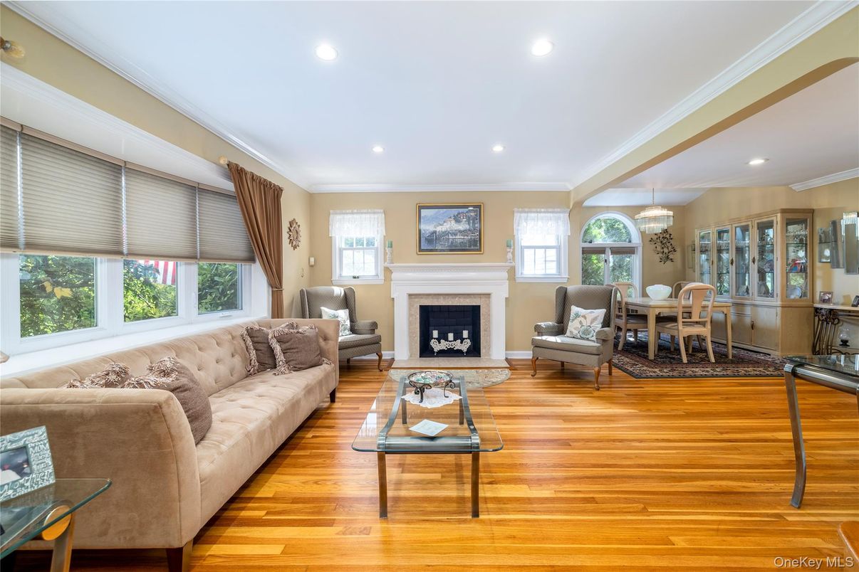 Dining room, Fireplace, Interior, Living room, Pendant Lights, Recessed Lighting, Wood Texture Flooring
