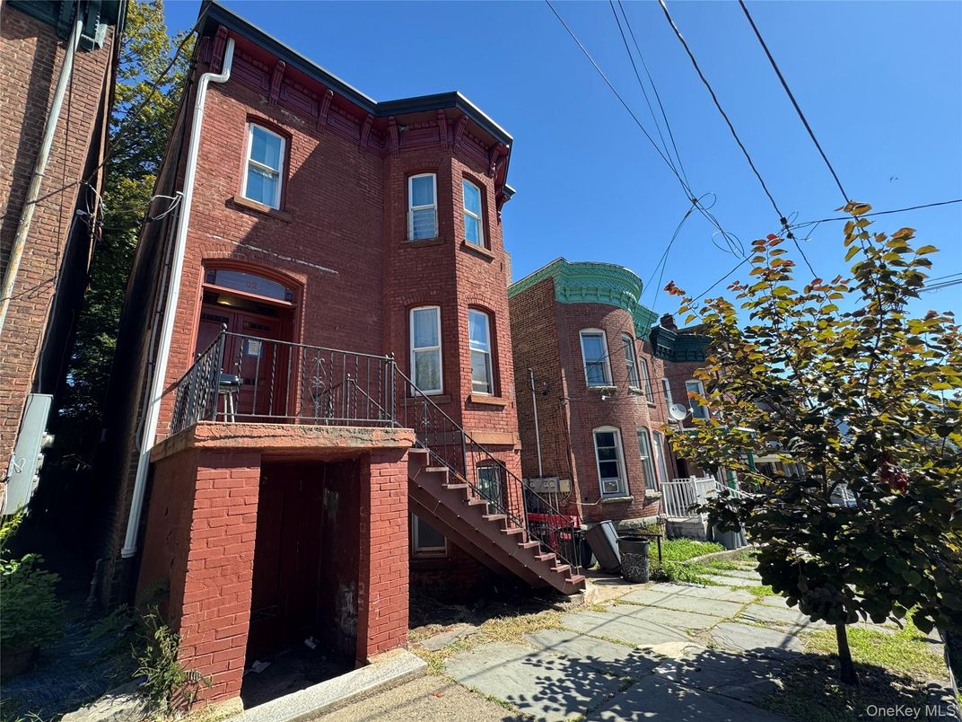Exterior, Facade, Brick Facade, Rowhouse