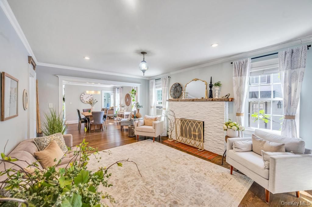 Dining room, Fireplace, Interior, Living room, Recessed Lighting, Wood Texture Flooring
