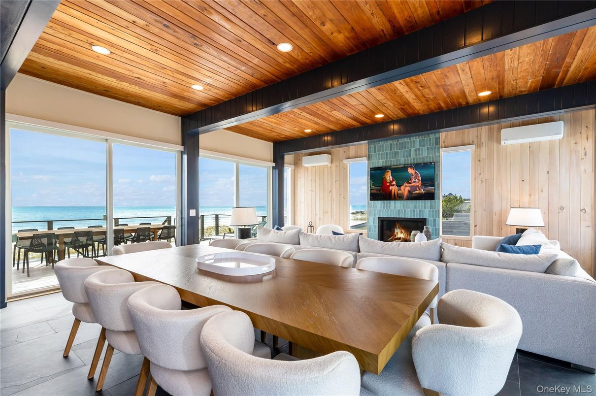 Dining room, Fireplace, Interior, Living room, Recessed Lighting, Water, Wooden Beams, Wooden Ceilings, Wooden Walls