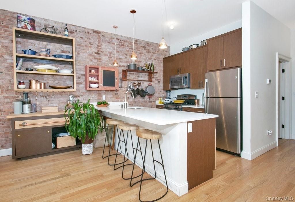Interior, Kitchen, Pendant Lights, Stainless Steel Appliances, Stone Walls, Wood Texture Flooring