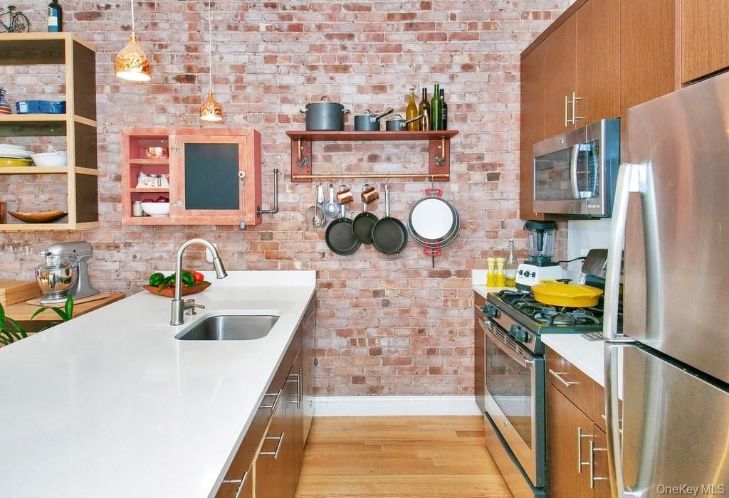Interior, Kitchen, Pendant Lights, Stainless Steel Appliances, Stone Walls, Wood Texture Flooring