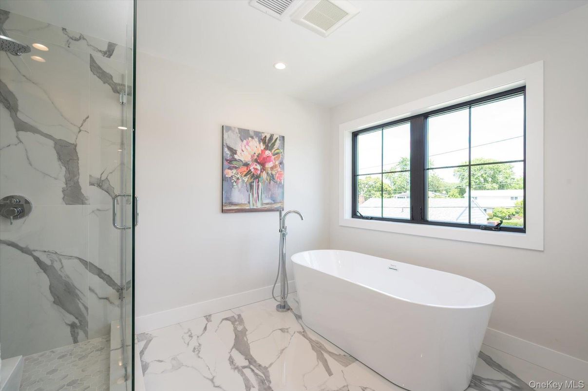 Bathroom, Free Standing Baths, Glass Shower, Interior, Marble, Marble Walls, Recessed Lighting