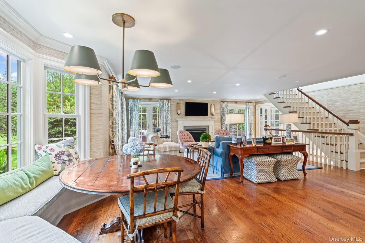 Dining room, Fireplace, Interior, Living room, Pendant Lights, Recessed Lighting, Wood Texture Flooring