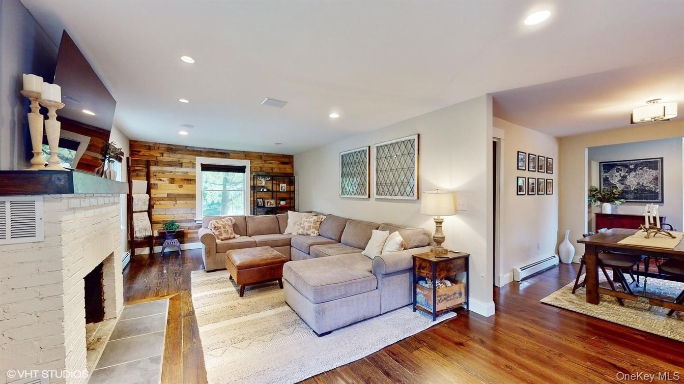 Dining room, Fireplace, Interior, Living room, Recessed Lighting, Wood Texture Flooring, Wooden Walls