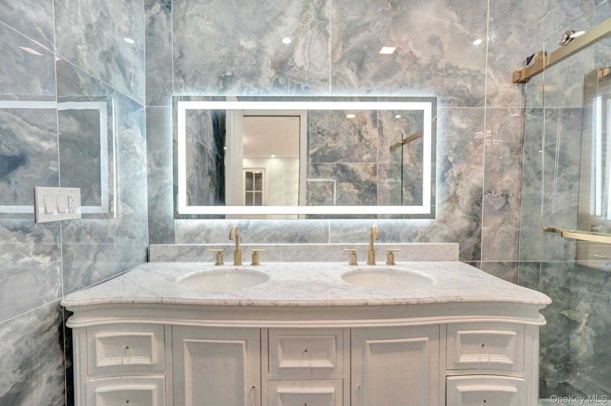 Bathroom, Dual Sink Vanities, Glass Shower, Interior, Marble Walls