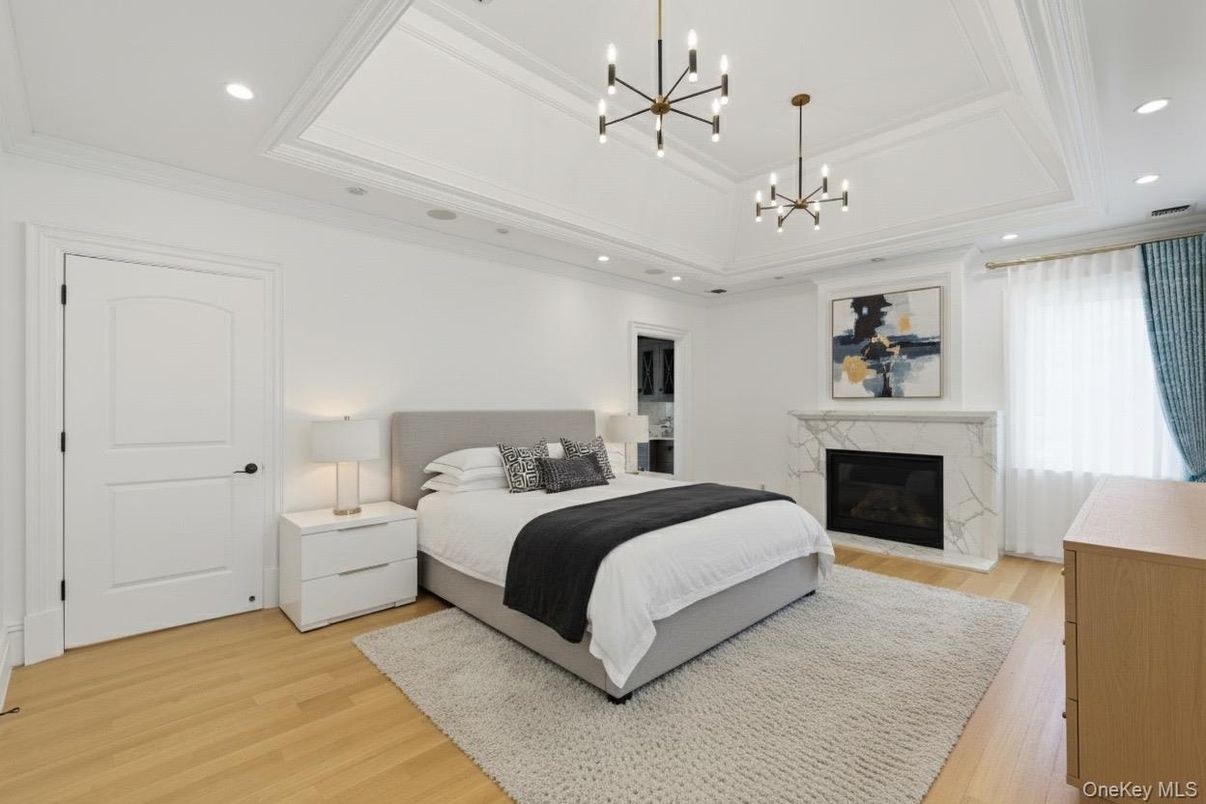 Bedroom, Fireplace, Interior, Pendant Lights, Recessed Lighting, Wood Texture Flooring
