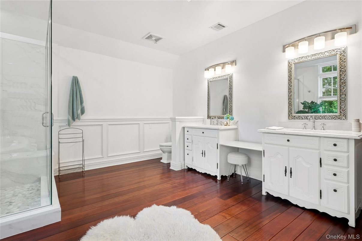 Bathroom, Dual Sink Vanities, Interior, Marble Walls, Wood Texture Flooring