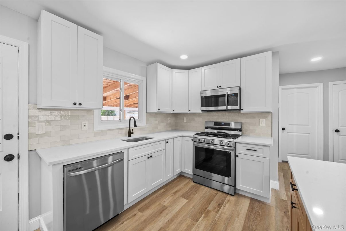 Interior, Kitchen, Recessed Lighting, Stainless Steel Appliances, Wood Texture Flooring