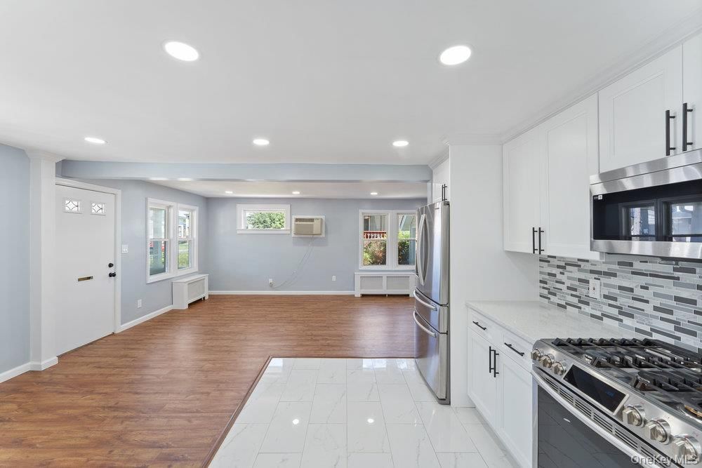 Interior, Kitchen, Marble, Recessed Lighting, Stainless Steel Appliances, Wood Texture Flooring