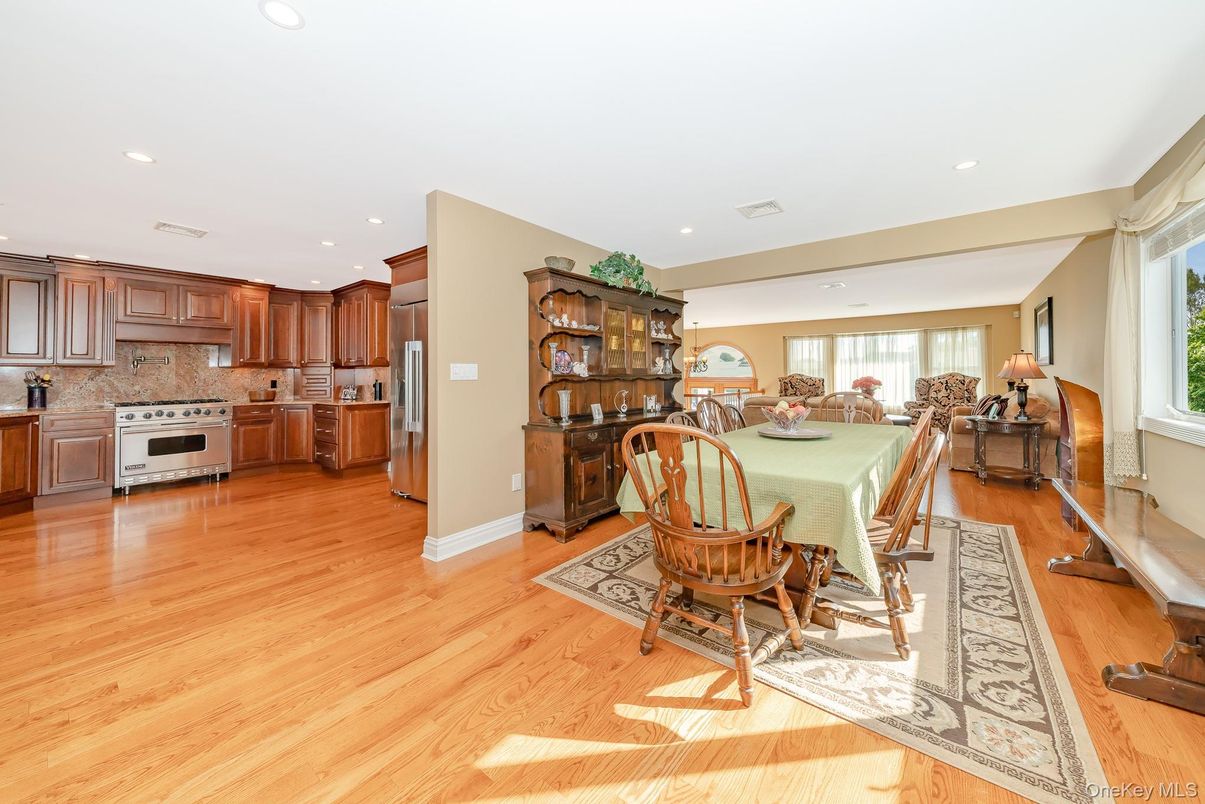 Dining room, Interior, Kitchen, Recessed Lighting, Stainless Steel Appliances, Wood Texture Flooring
