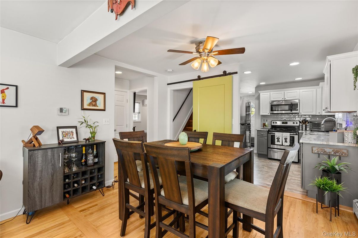 Dining room, Interior, Kitchen, Recessed Lighting, Stainless Steel Appliances, Wood Texture Flooring