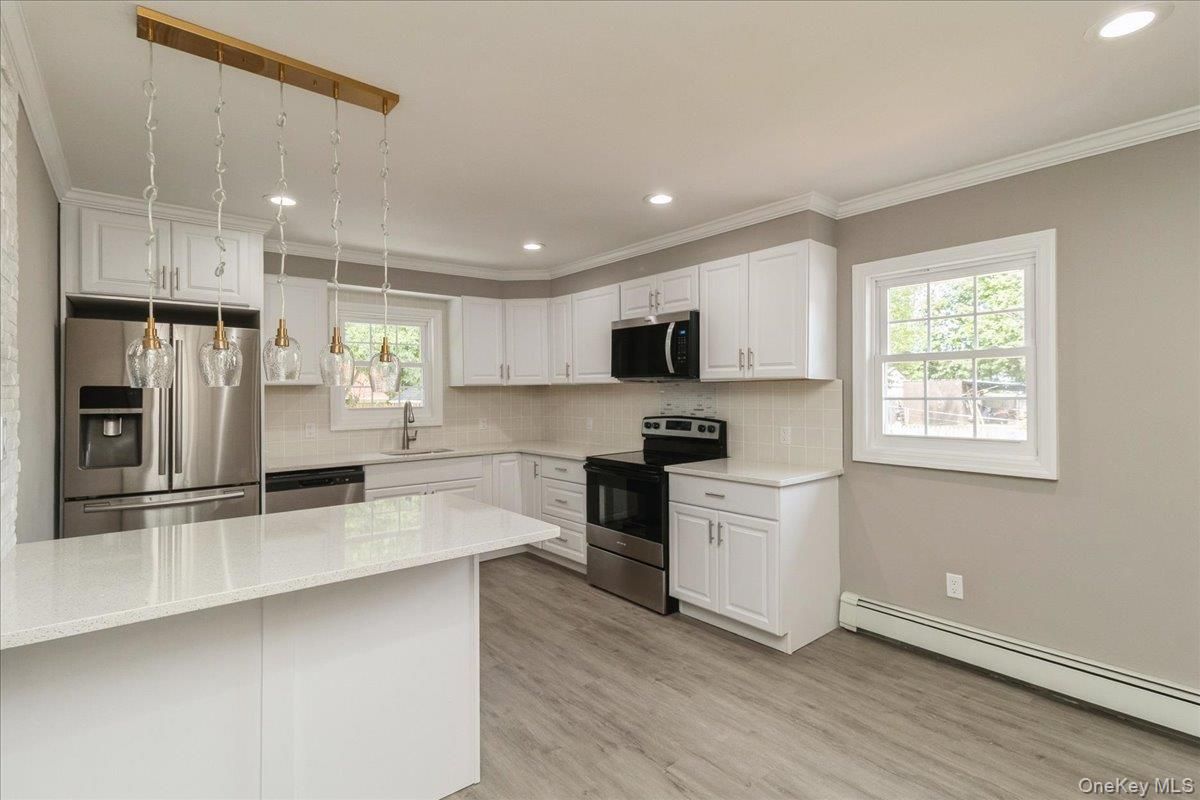 Interior, Kitchen, Pendant Lights, Recessed Lighting, Stainless Steel Appliances, Wood Texture Flooring