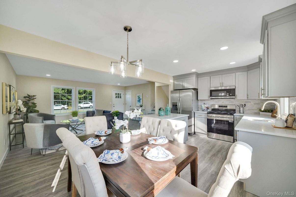 Dining room, Interior, Kitchen, Living room, Pendant Lights, Recessed Lighting, Stainless Steel Appliances, Wood Texture Flooring