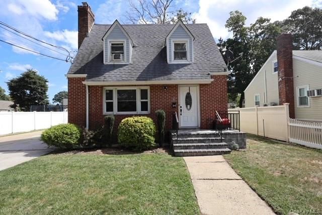Exterior, Facade, Brick Facade, Cape Cod