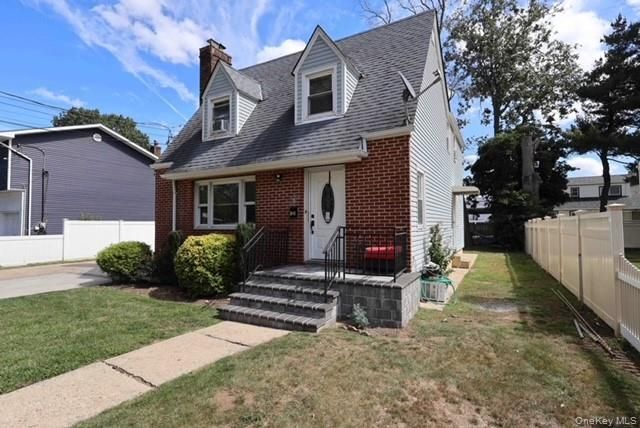Exterior, Facade, Brick Facade, Cape Cod