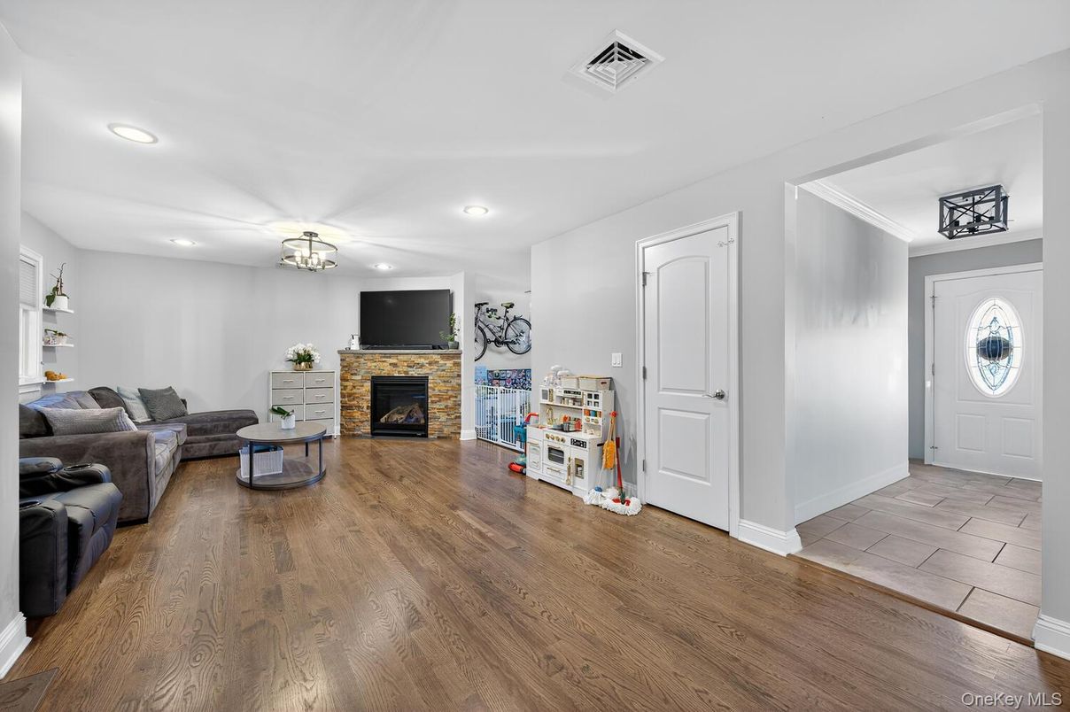 Fireplace, Interior, Living room, Recessed Lighting, Wood Texture Flooring