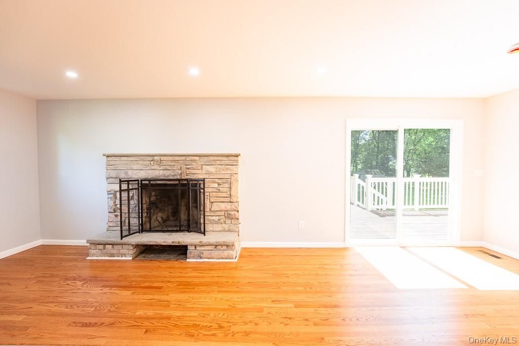 Empty room, Fireplace, Interior, Recessed Lighting, Wood Texture Flooring