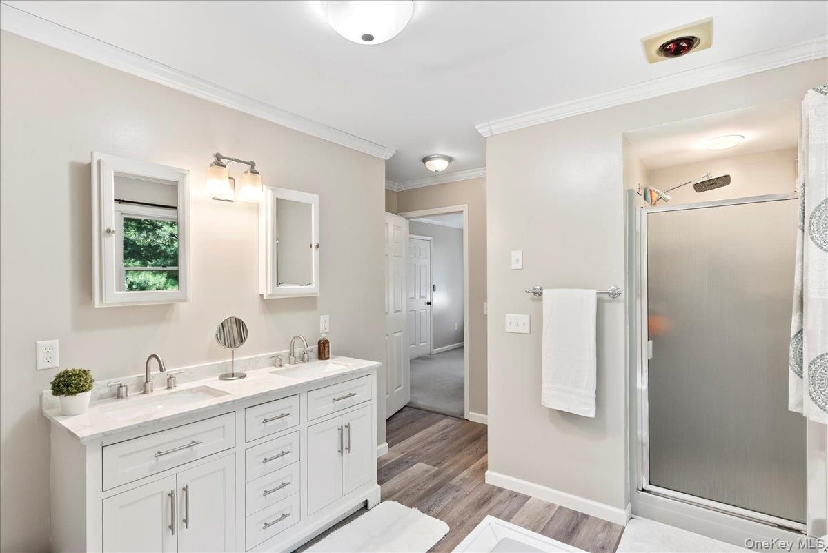 Bathroom, Dual Sink Vanities, Glass Shower, Interior, Wood Texture Flooring