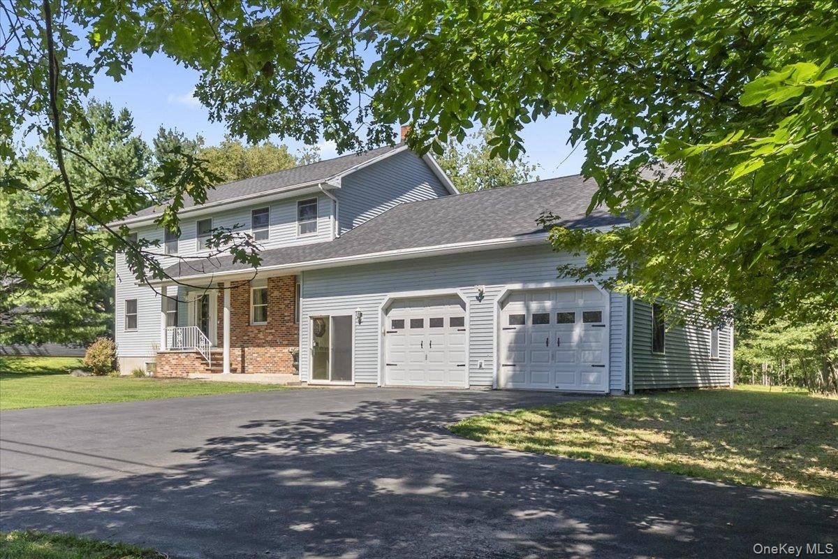 Attached, Exterior, Facade, Brick Facade, Cape Cod
