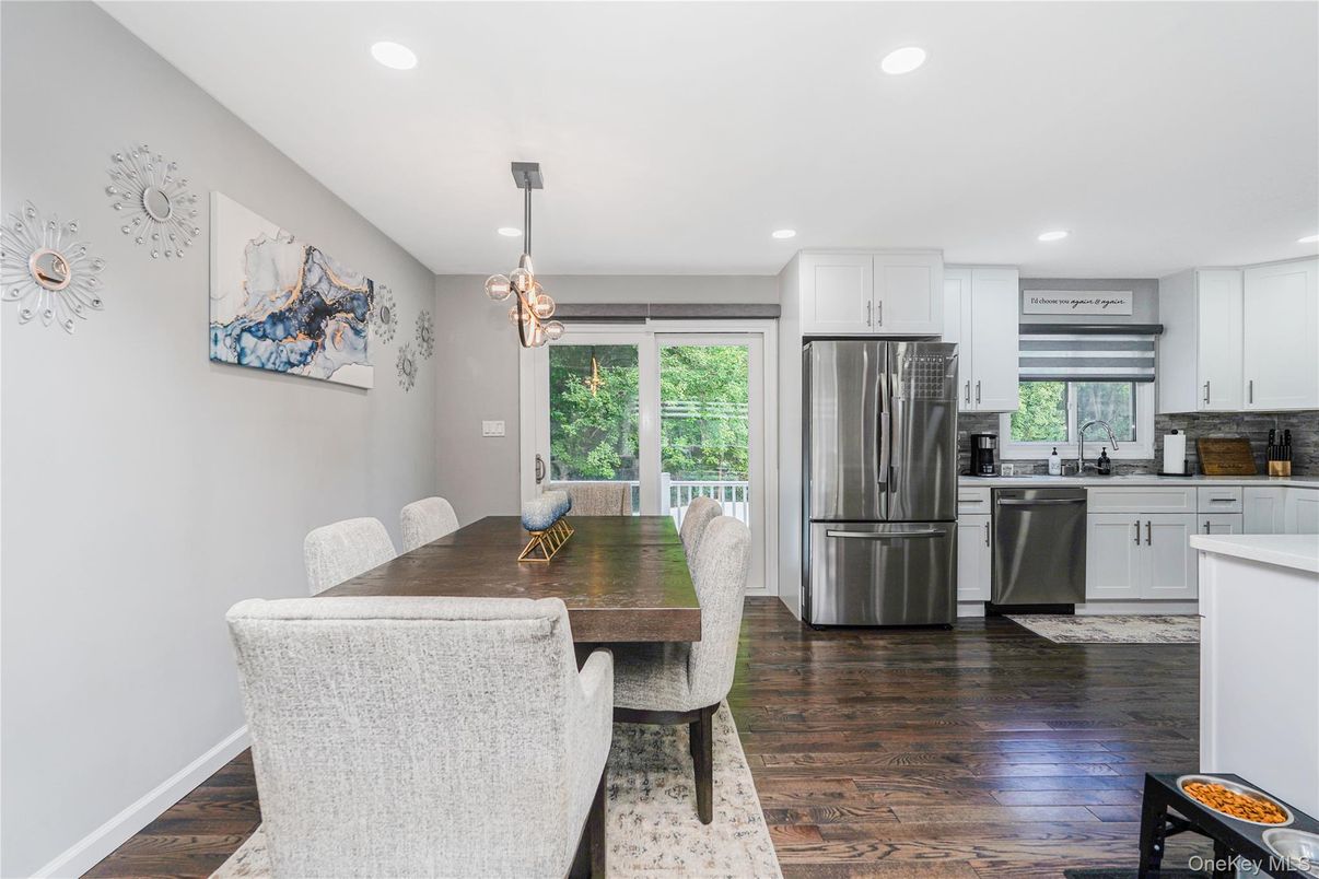 Dining room, Interior, Kitchen, Pendant Lights, Recessed Lighting, Stainless Steel Appliances, Wood Texture Flooring