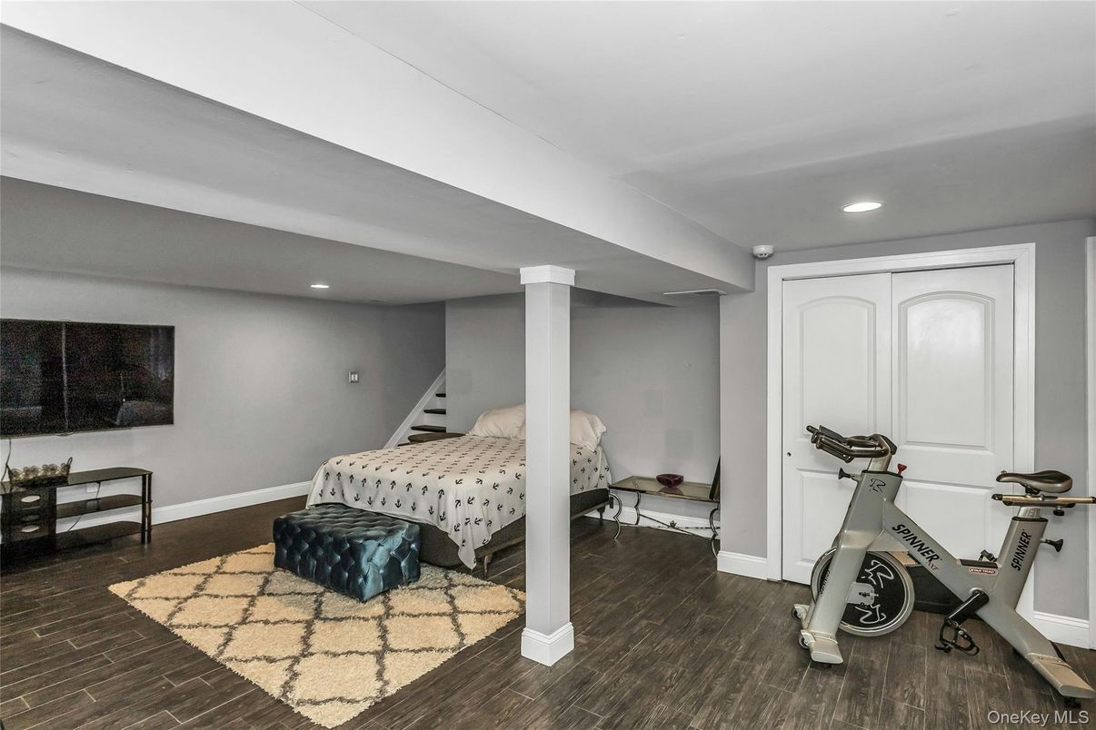 Bedroom, Fitness Equipment, Interior, Recessed Lighting, Wood Texture Flooring
