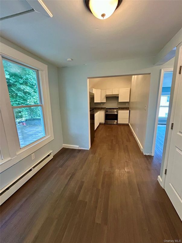 Empty room, Interior, Kitchen, Stainless Steel Appliances, Wood Texture Flooring