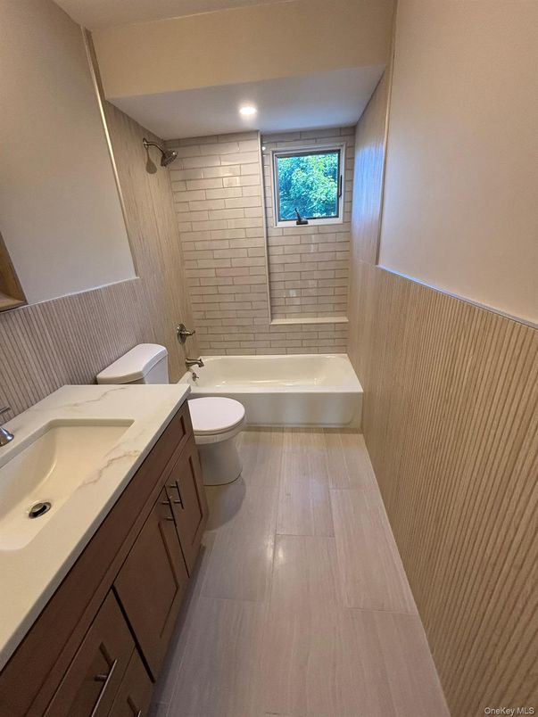 Bathroom, Dual Sink Vanities, Interior, Recessed Lighting, Wood Texture Flooring
