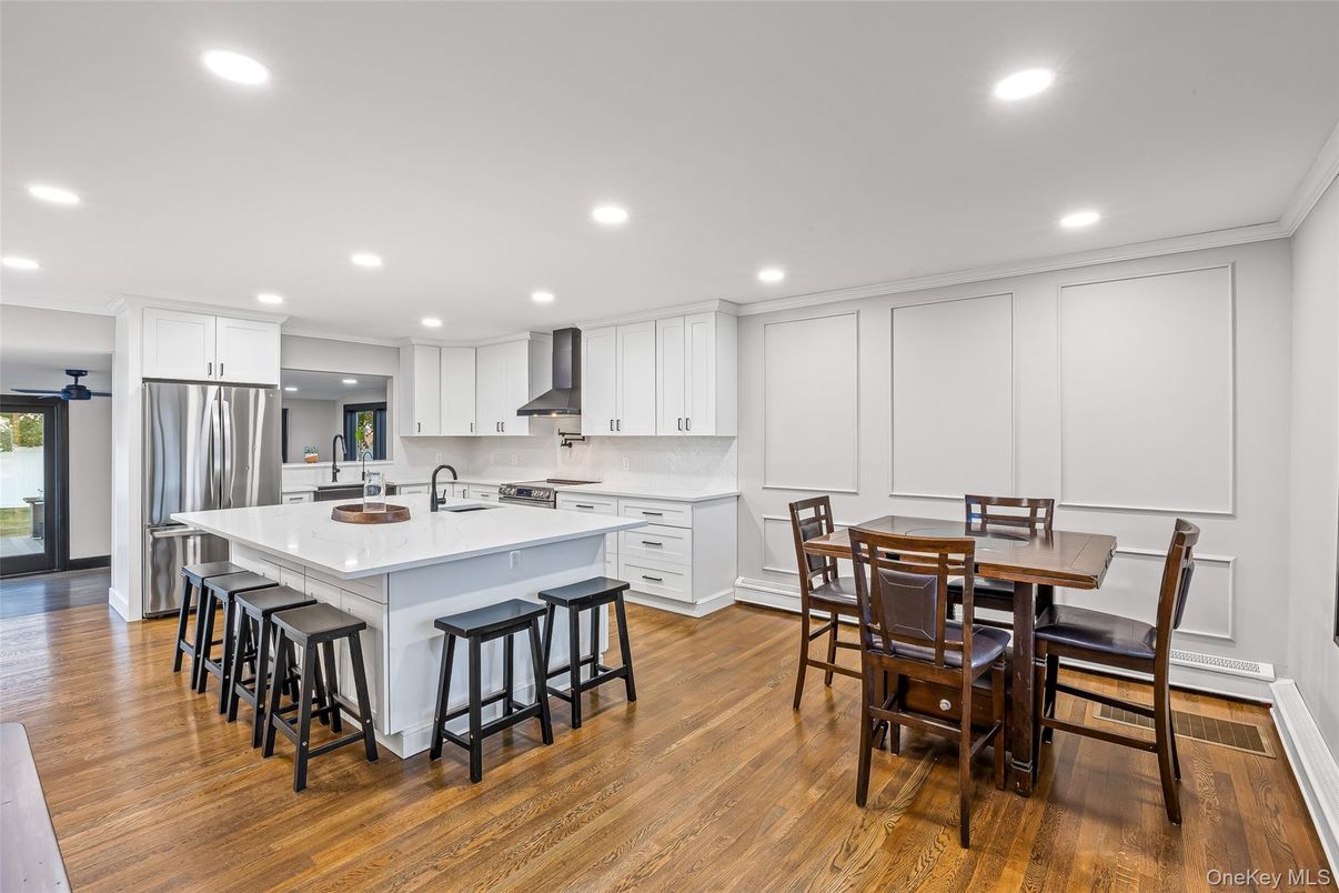 Dining room, Interior, Kitchen, Recessed Lighting, Stainless Steel Appliances, Wood Texture Flooring