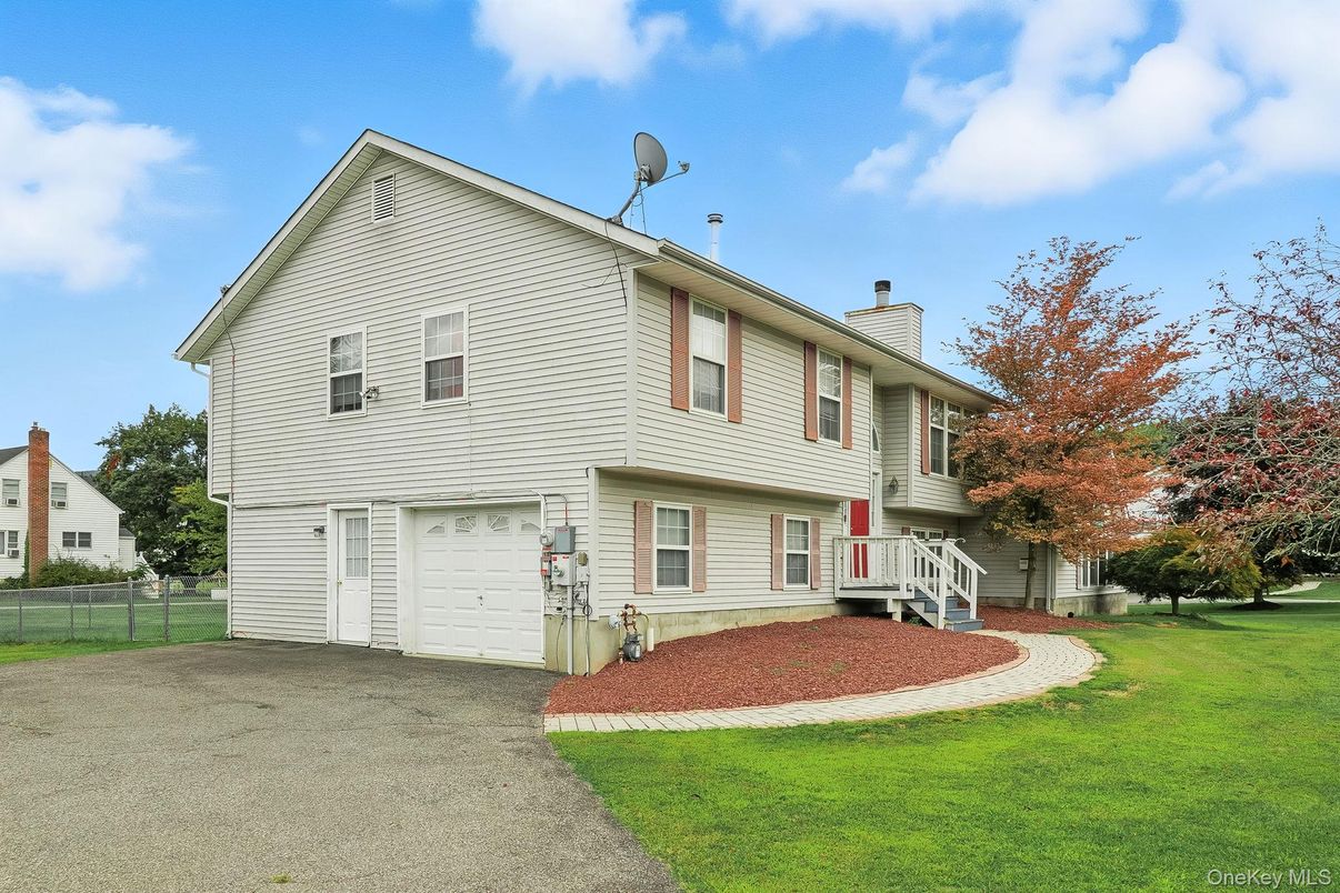 Attached, Backyard, Exterior, Facade, Split Level