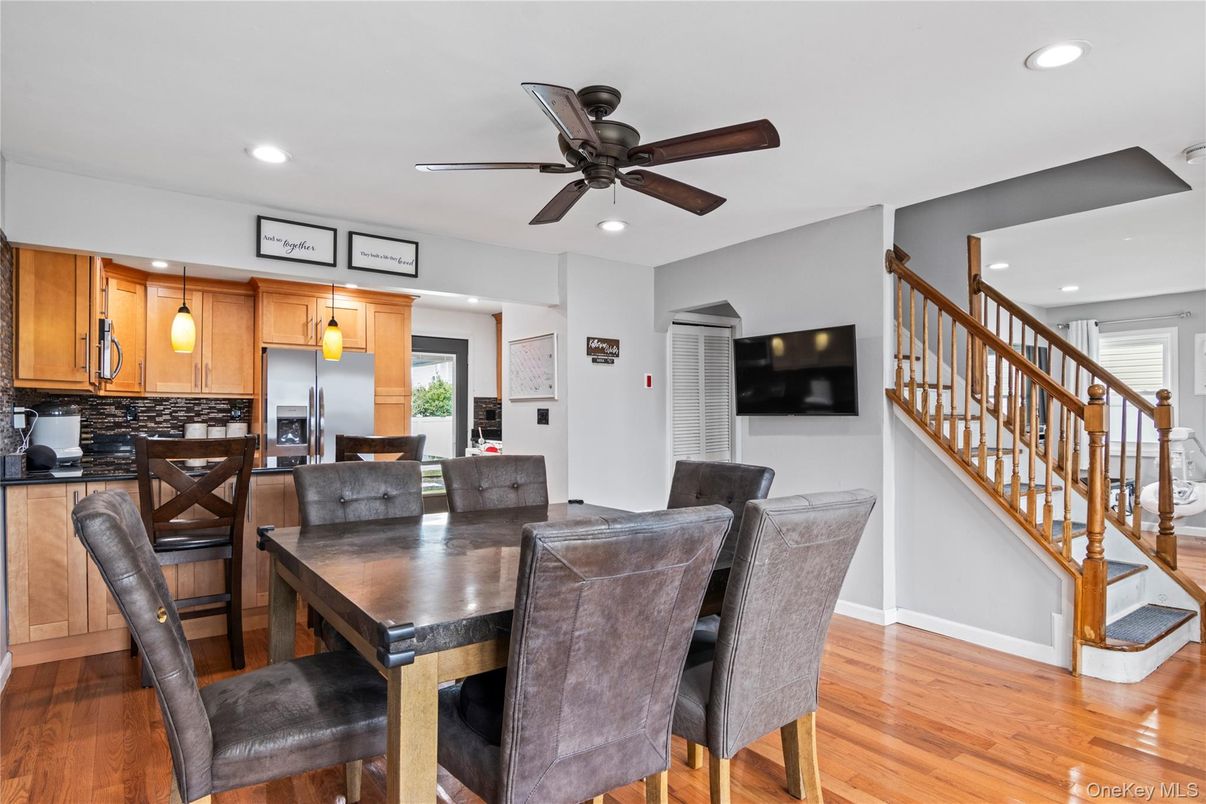 Dining room, Interior, Kitchen, Pendant Lights, Recessed Lighting, Stainless Steel Appliances, Wood Texture Flooring