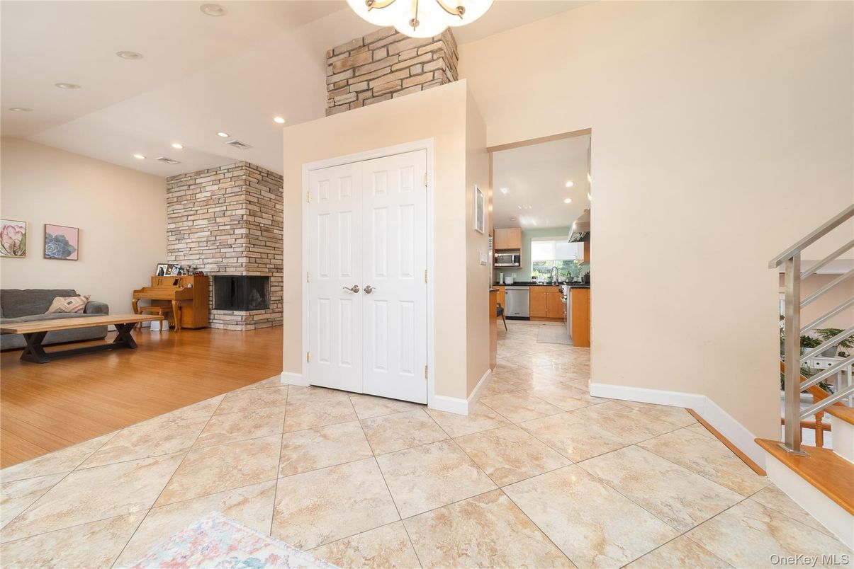 Fireplace, Interior, Kitchen, Recessed Lighting, Stone Walls, Wood Texture Flooring