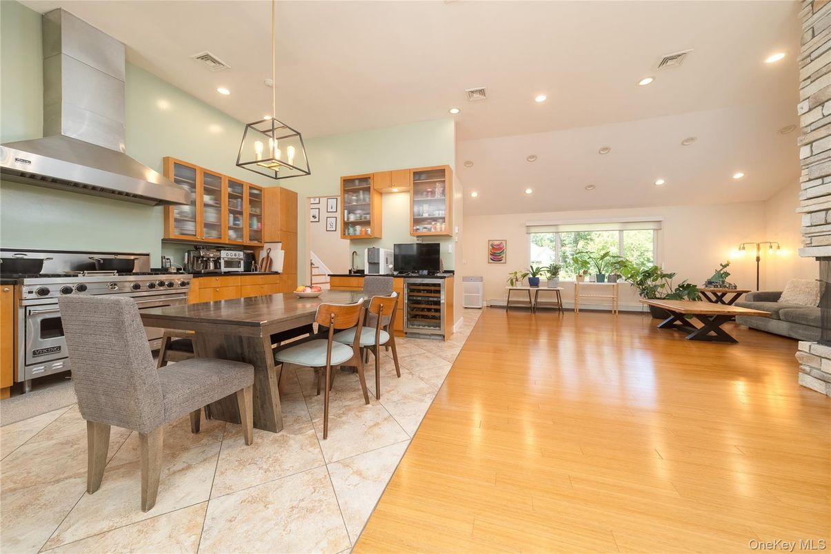 Dining room, Interior, Kitchen, Living room, Pendant Lights, Recessed Lighting, Stainless Steel Appliances, Wood Texture Flooring
