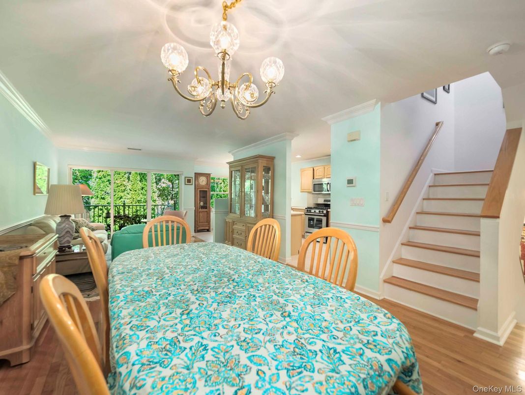 Chandelier, Dining room, Interior, Kitchen, Recessed Lighting, Stainless Steel Appliances, Wood Texture Flooring