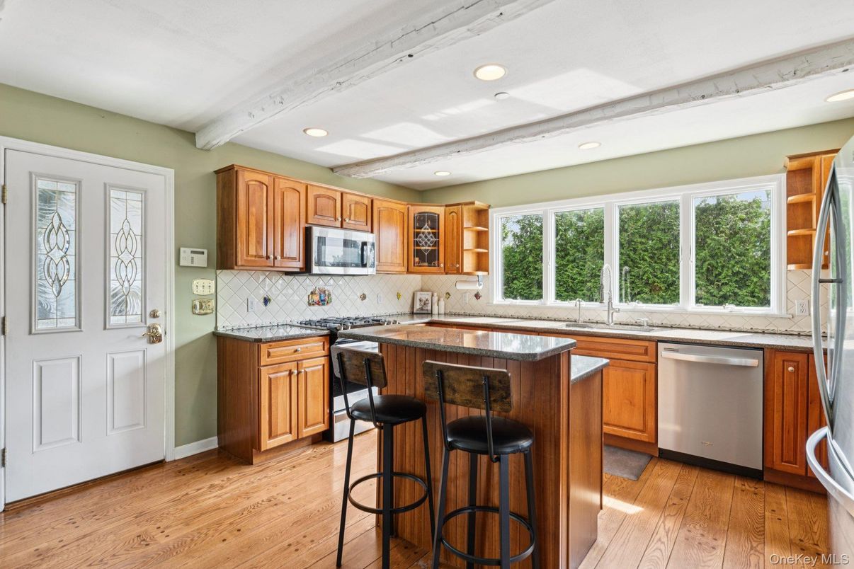 Interior, Kitchen, Recessed Lighting, Tile Countertops, Wood Texture Flooring