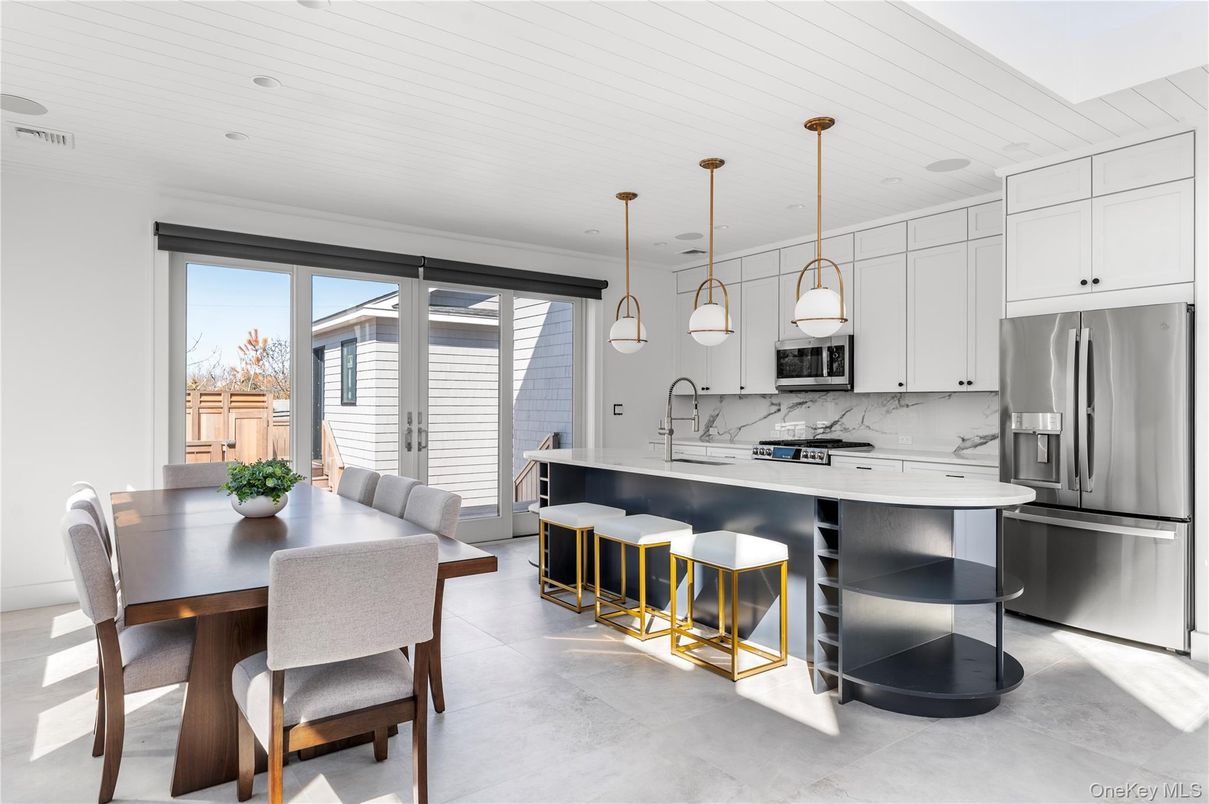 Dining room, Interior, Kitchen, Marble Walls, Pendant Lights, Recessed Lighting, Stainless Steel Appliances