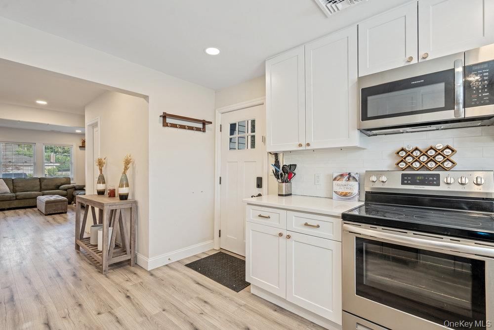 Interior, Kitchen, Living room, Recessed Lighting, Stainless Steel Appliances, Wood Texture Flooring