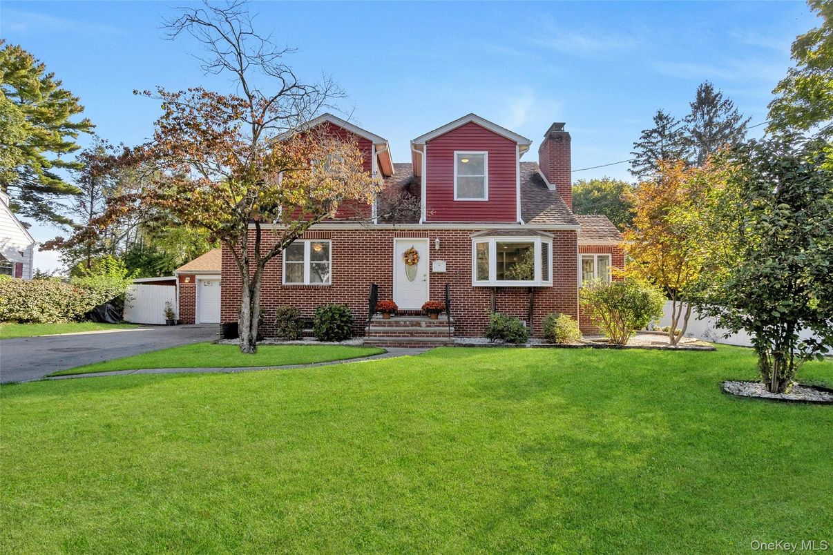 Exterior, Facade, Brick Facade, Cape Cod